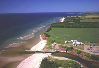 Aerial view of Basin Head
 with Sandy's Beach 
(white strip in upper part of picture)